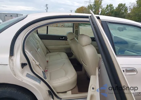 1997 Lincoln Continental from USA, damaged, VIN 1LNLM97V7VY673833